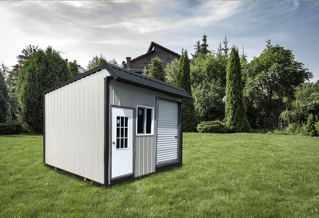Single slope metal shed with garage door and window